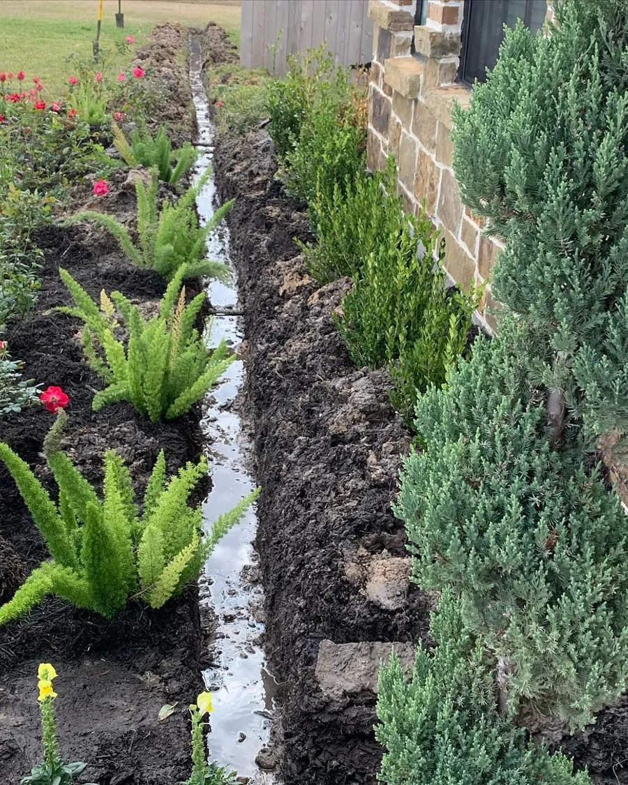 Fresh planting bed with stone edging