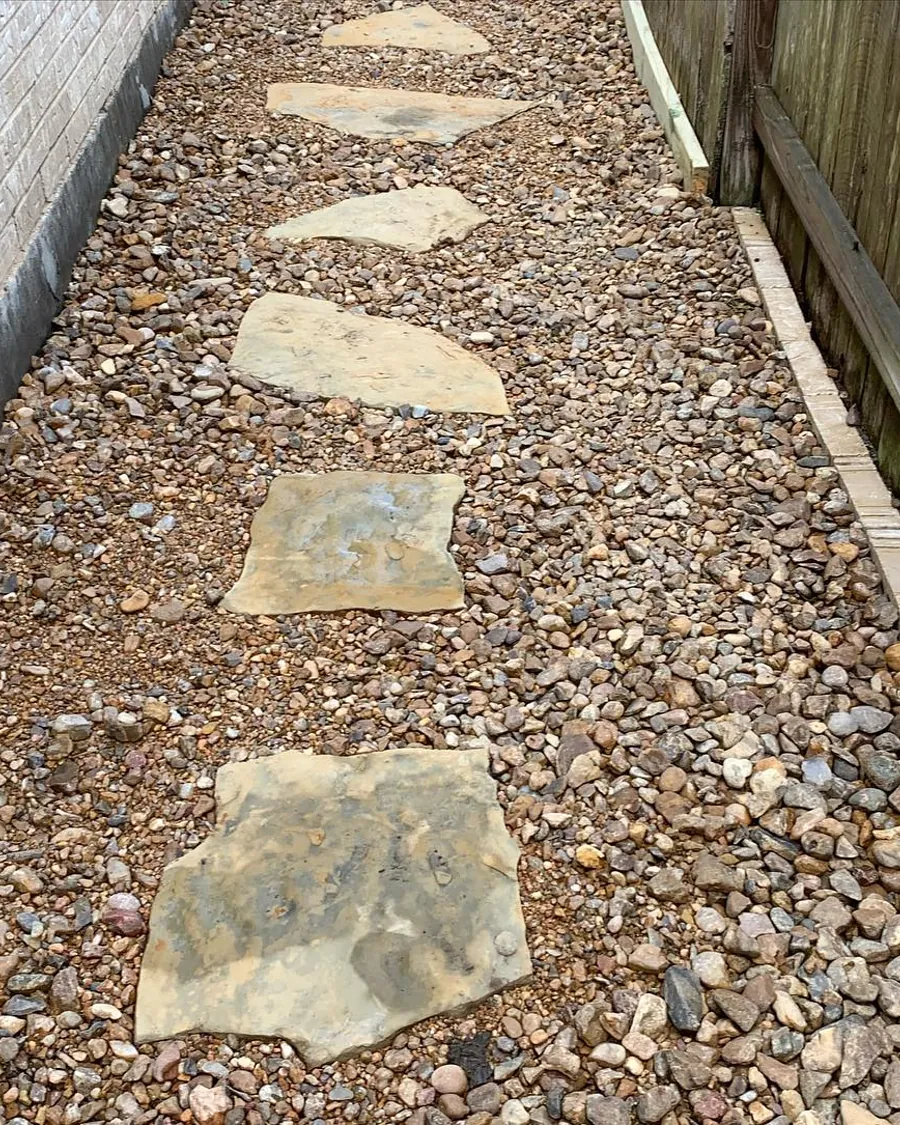 Flagstone stepping-stone path along a side yard